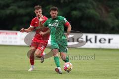 Landesliga - Saison 2024/25 - SV Manching - FSV Pfaffenhofen - Maurice Untersänger rot Pfaffenhofen - Daniel Spies (Nr.22 - SV Manching) - Foto: Meyer Jürgen