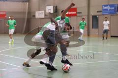 Hallenturnier Ingolstadt Nord - Saison 2024/25 - MBB SG MAnching - FC Fatih Ingolstadt  - Ali Erbas weisss Manching - Faniel Brhane grün Fatih - Foto: Meyer Jürgen