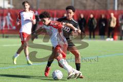 B-Junioren Bundesliga  - Saison 2023/24 - B-Junioren - FC Ingolstadt 04 - FC Bayern München - Jackson Taysir schwarz FCI - Nasrawe Jussef weiss München - Foto: Meyer Jürgen