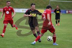 Kreisliga - Saison 2024/25- SV Kasing - SV Eitensheim - Nick Heidenreich rot Eitensheim - Fabian Wölkhammer schwarz Kasing - Foto: Meyer Jürgen