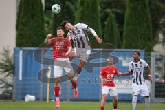 Bayernliga Nord - Saison 2026/27 - FC Ingolstadt 04 II - ASV Cham - Lucas Chrubasik rot Cham - Ioannis Petkos (Nr.18 - FCI II) - Foto: Meyer Jürgen
