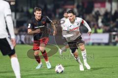 3. Liga; SC Verl - FC Ingolstadt 04; Jonas Scholz (15, FCI) Zweikampf Kampf um den Ball Gayret Timur (30 Verl)