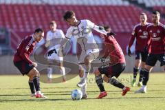 Testspiel; 1. FC Nürnberg - FC Ingolstadt 04 - Zweikampf Kampf um den Ball Max Besuschkow (17, FCI) Justvan Julian (10 FCN) Castrop Jens (17 FCN)