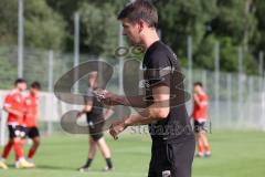 Bayernliga - Saison 2023/2024 - FC Ingolstadt 04 II - U21 - Trainingsauftakt - Cheftrainer Thomas Karg (FCI II) mit Stoppuhr - Foto: Meyer Jürgen