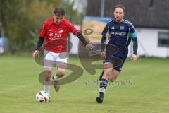 Kreisliga - Saison 2025/26- SV Hundszell - TV Münchsmünster - Maximilian Anthofer blau Münchsmünster - Lukas Konradi rot Hundszell - Foto: Meyer Jürgen