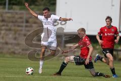 A-Junioren - DFB Pokal  - Saison 2024/25 - A-Junioren - FC Ingolstadt 04 - Hannover 96 - Berk Baran weiss FCI - Lange Anton rot Hannover - Foto: Meyer Jürgen