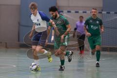 Hallenturnier Ingolstadt Nord - Saison 2024/25 - FC Geisenfeld - TSV Etting - Furkan Bayraktar grün Geisenfeld - Valentin Dietrich weisss Etting - Foto: Meyer Jürgen