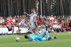 2. Bundesliga - Testspiel - FC Ingolstadt 04 - 1. FC Nürnberg 2:1 - Mathew Leckie (7) wird vom Torwart Patrick Rakovsky in den ersten Minuten gefoult, Elfmeter