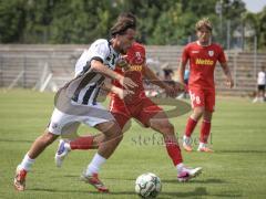 Bayernliga Nord - Saison 2026/27 - FC Ingolstadt 04 II - Jahn Regensburg II - Can Paylan (Nr.6 - FCI II) - Noah Rettich rot Regensburg - Foto: Meyer Jürgen