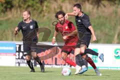 Kreisklasse - Saison 2023/2024 -SV Zuchering - SV Oberstimm - Nicholas Henning schwarz Oberstimm - Nico Ziegler rot Zuchering - Foto: Meyer Jürgen