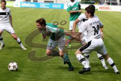 FC Gerolfing - SV Erlbach - Huber Stefan (grün Gerolfing) - Baumann Philipp (#10 Erlbach) - Foto: Jürgen Meyer