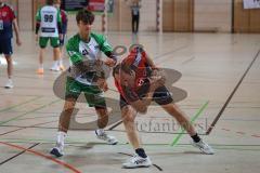 Handball - Bezirksliga - Saison 2026/27 - HC Donau/Paar - TSV Gaimersheim - Rieck Tjark rot HC Donau/Paar - Päseler Fabio grün Gaimersheim -  Foto: Meyer Jürgen
