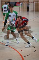 Handball - Bezirksliga - Saison 2026/27 - HC Donau/Paar - TSV Gaimersheim - Rieck Tjark rot HC Donau/Paar - Päseler Fabio grün Gaimersheim -  Foto: Meyer Jürgen
