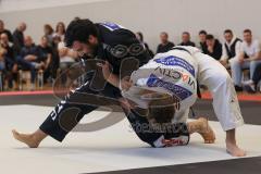 Judo - 2. Bundesliga - Männer - Saison 2024/25 - Judo - ESV Ingolstadt - Rüsselsheim-  - Mohamed Montassar Rouahi schwarz ESV -  - Nils Faßmann weiss Rüsselsheim - Foto: Meyer Jürgen