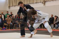 Judo - 2. Bundesliga - Männer - Saison 2024/25 - Judo - ESV Ingolstadt - Rüsselsheim-  - Jonas Holtman schwarz ESV - Nikita Hrek weiss Rüsselsheim - Foto: Meyer Jürgen