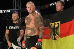 MMA - Young Blood Night - YBN Championship -77 kg - MARIO WITTMANN Ingolstadt gegen VLADIMIR FEDIN aus St. Petersburg, Russland - Urteil No Contest nach angeblichen Tiefschlag - Nationalhymne vor dem Kampf - links Trainer Gentian Morina