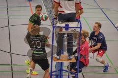 Volleyball - Saison 2026/27 - Donauholz Volleys Ingolstadt - SC Freising - Wasilewski Carl schwarz Donauholz Volleys #10 - Holcik Michal schwarz Donauholz Volleys #12 -  Blattenberger Johannes pink Freising #5 Foto: Meyer Jürgen
